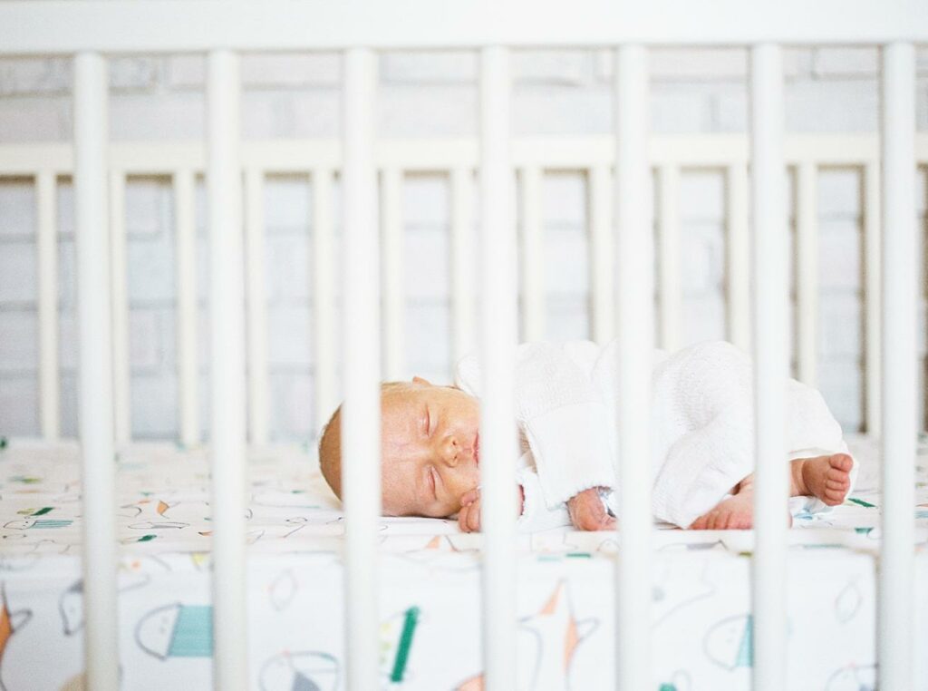 baby in crib, newborn, at home, natural light