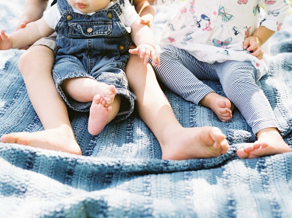 baby toes, siblings, blanket, outdoors, film
