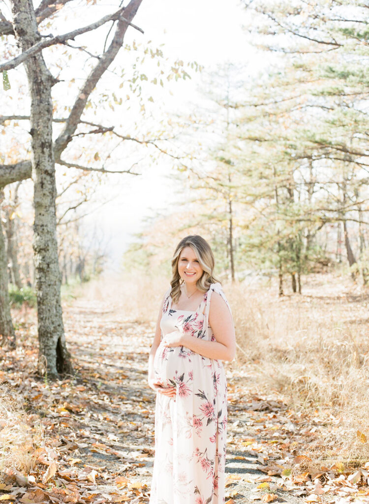 outdoor maternity session with long floral dress
