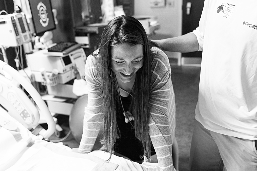 mom laughing in labor hospital