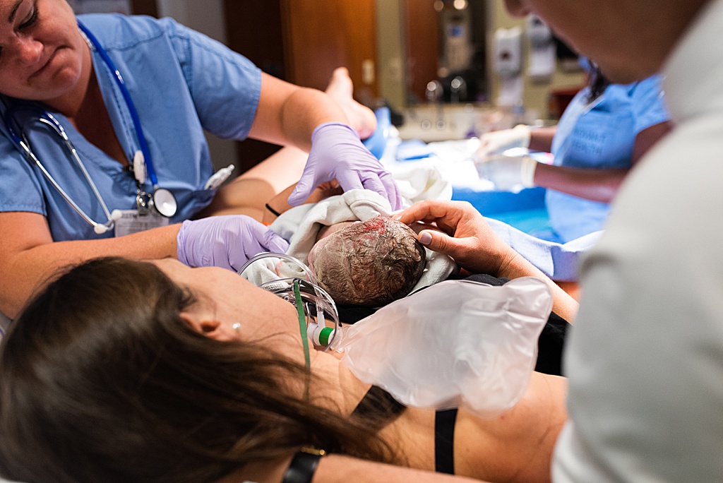 newborn baby on mom's chest skin to skin