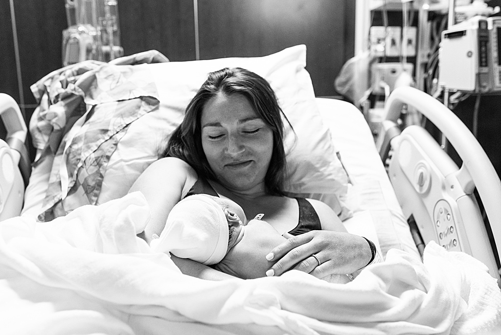 mom and baby girl in hospital bed