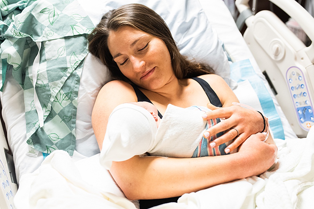 mom and baby in hospital bed