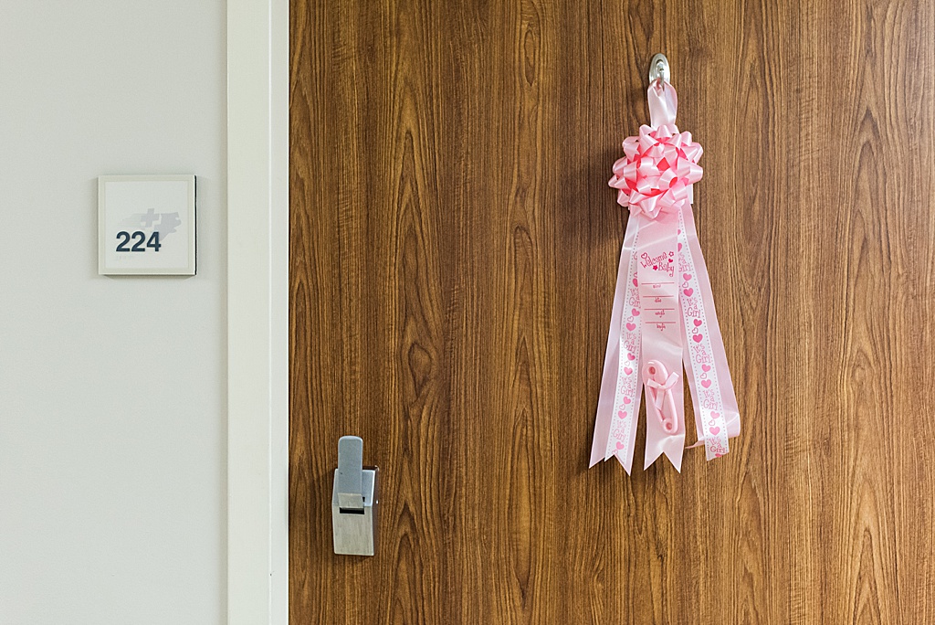 pink bow on hospital door, hospital birth
