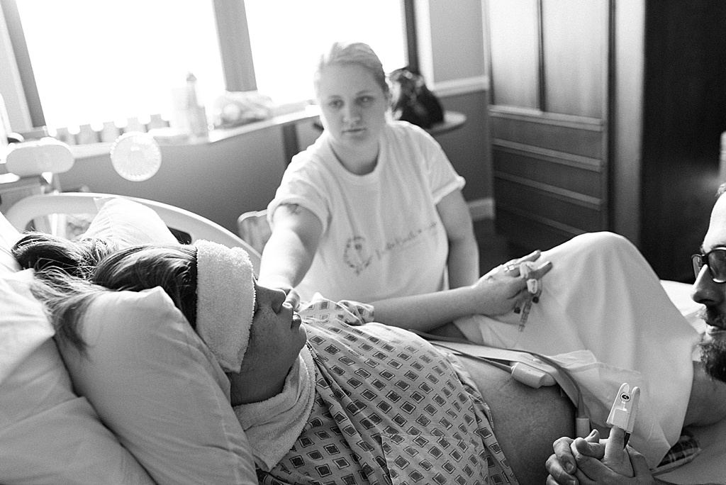 doula supporting mom during labor, hospital birth