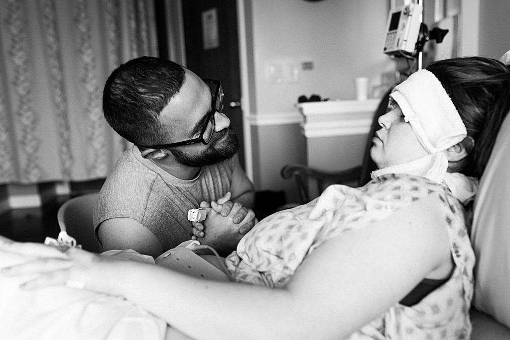 dad smiling at mom during labor