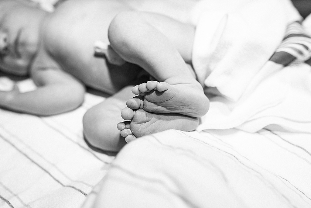 newborn baby feet, hospital blanket