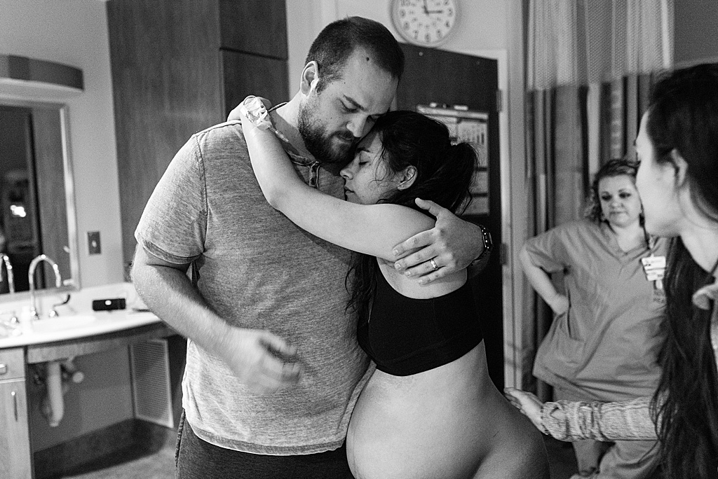 mom leaning on dad during labor