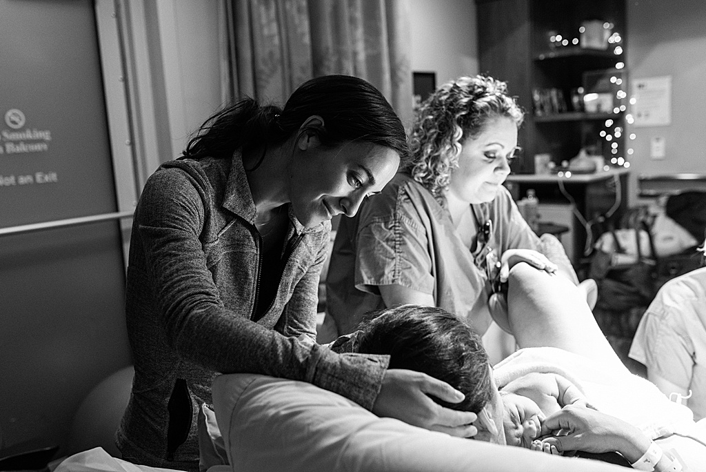 sister supporting mom after birth