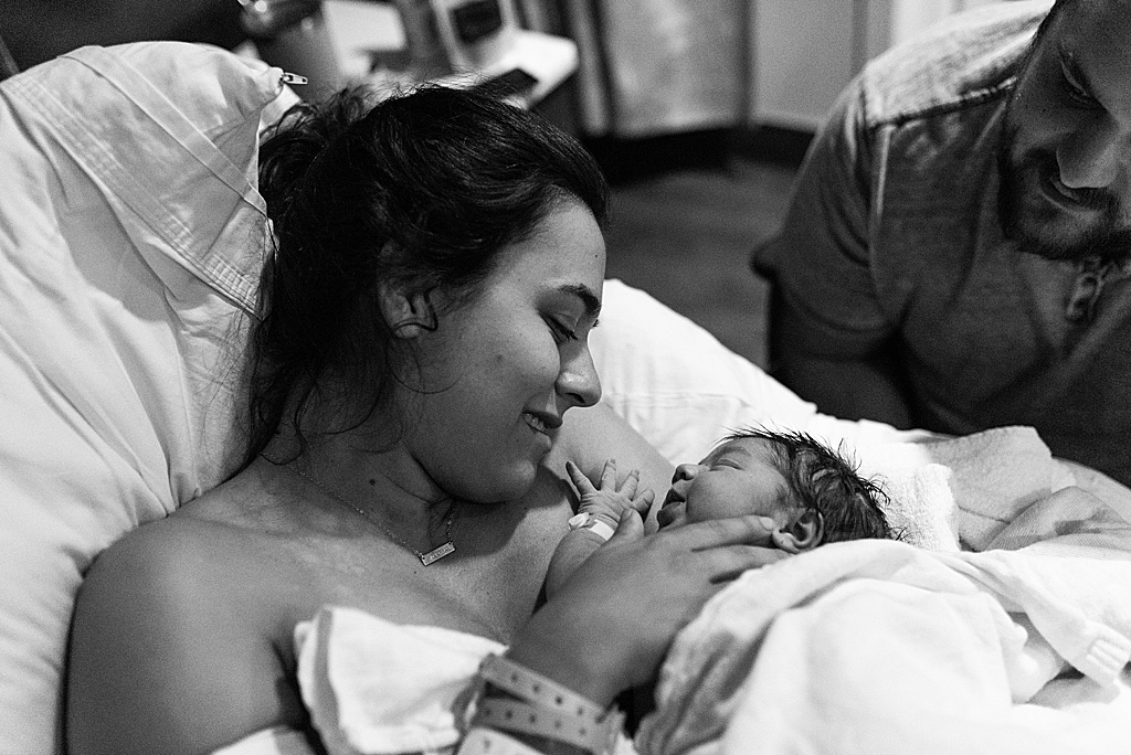 mother and daughter after birth in hospital
